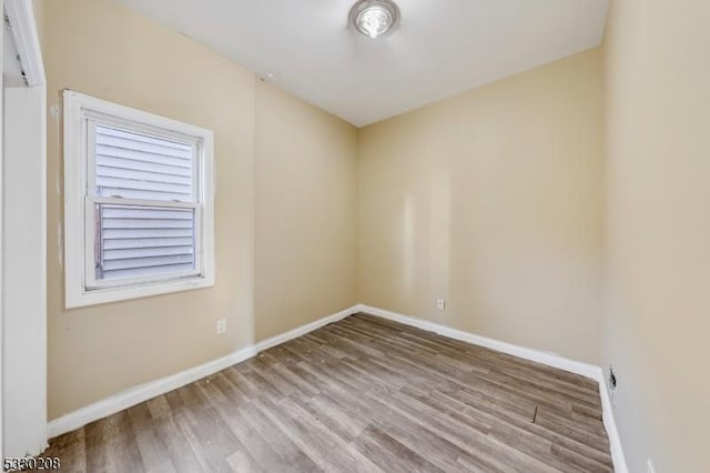 empty room with light wood-type flooring