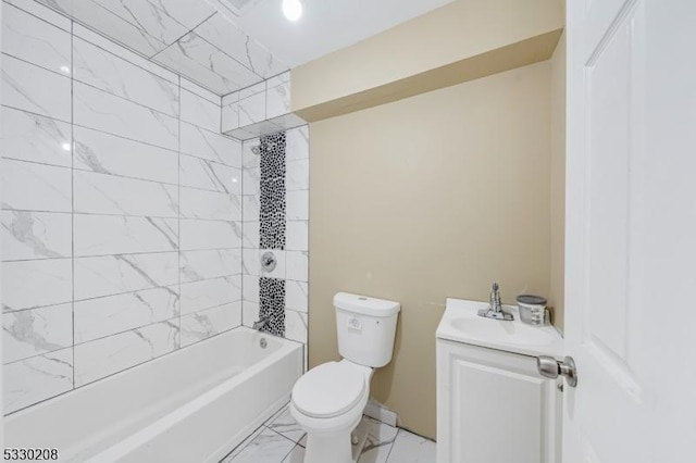 full bathroom featuring vanity, toilet, and tiled shower / bath combo