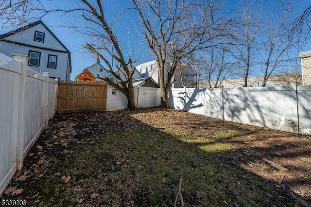 view of yard layered in snow