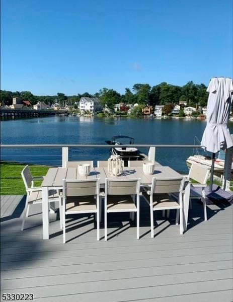 dock area with a water view