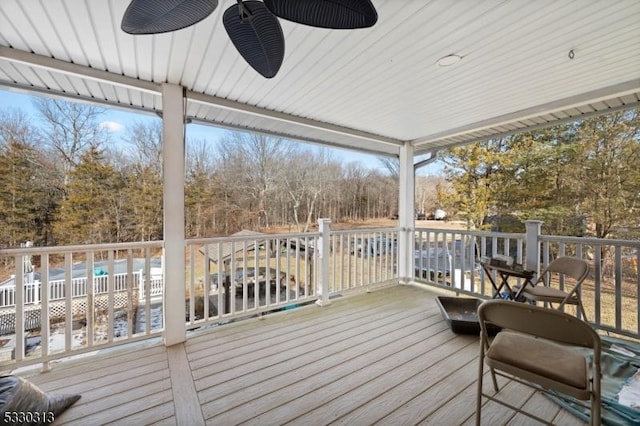 wooden deck with ceiling fan