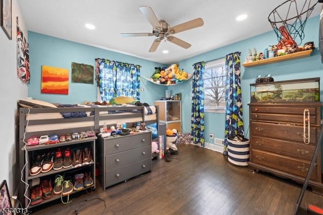 bedroom featuring ceiling fan and dark wood-type flooring