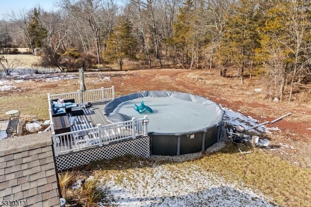 exterior space featuring a pool side deck