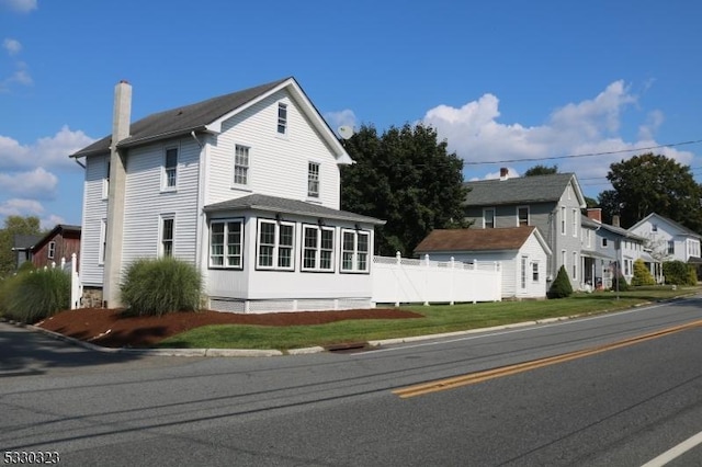 exterior space with a front yard