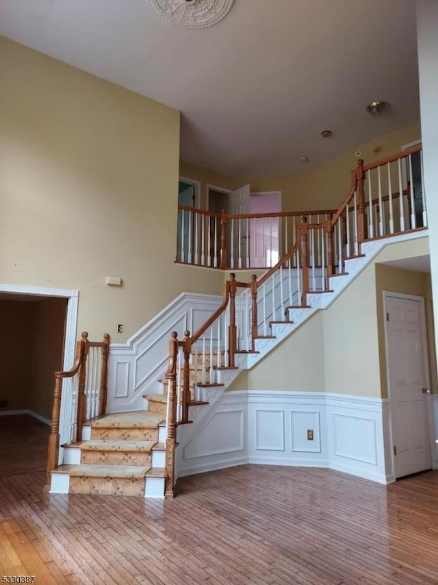 stairs with wood-type flooring