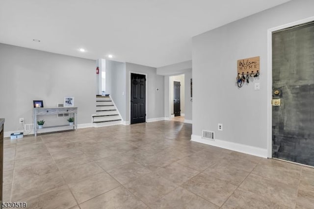 interior space with light tile patterned floors