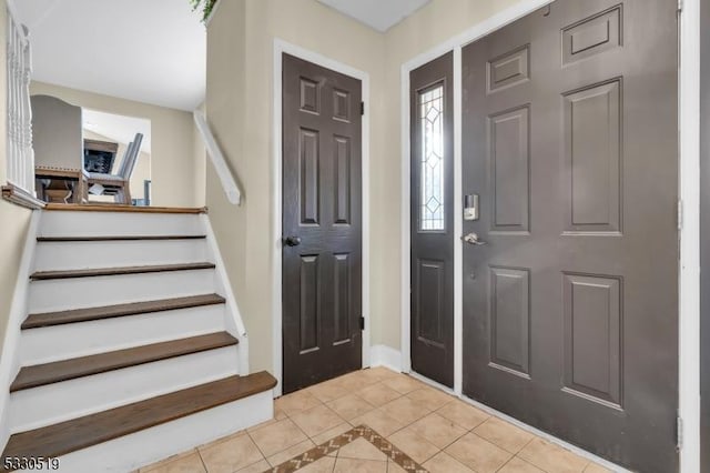 view of tiled entrance foyer