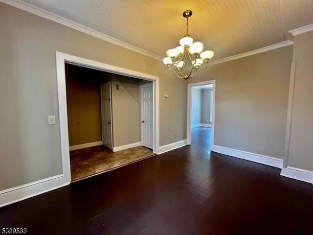 unfurnished dining area with crown molding, wood-type flooring, and a notable chandelier