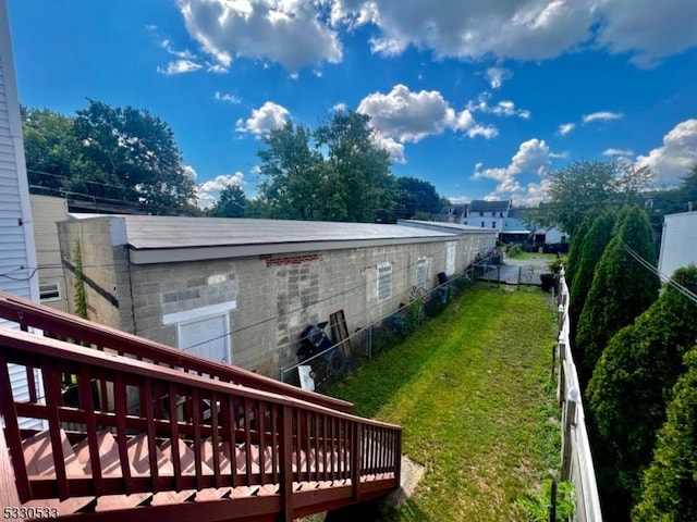 view of yard with a wooden deck