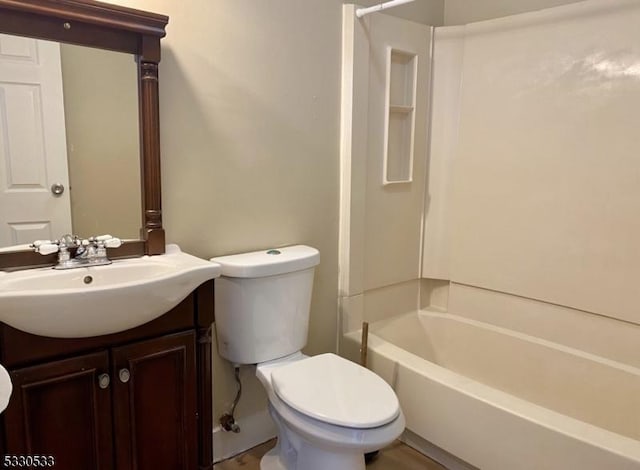 full bathroom featuring vanity, toilet, and bathing tub / shower combination