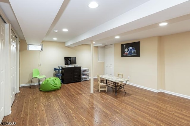 home office with hardwood / wood-style flooring