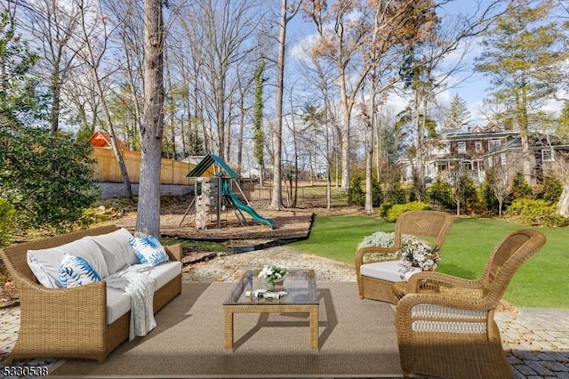 view of patio / terrace with outdoor lounge area and a playground