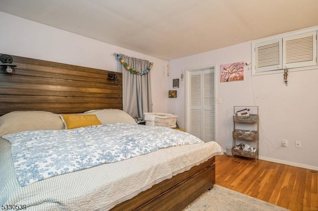 bedroom featuring wood-type flooring