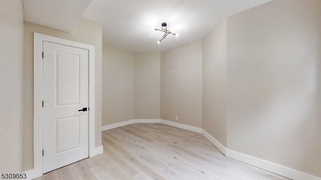 unfurnished room featuring light hardwood / wood-style floors