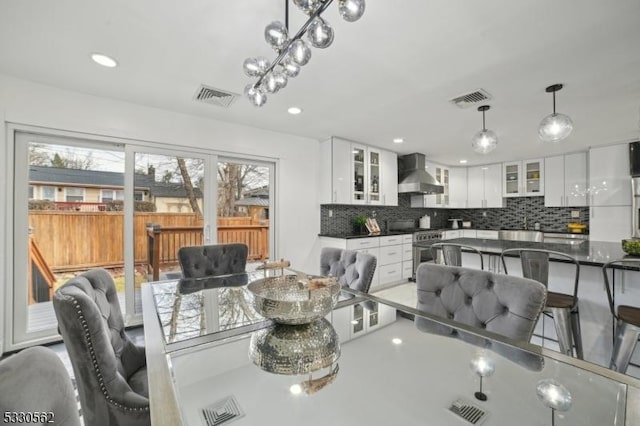 dining area with visible vents and recessed lighting