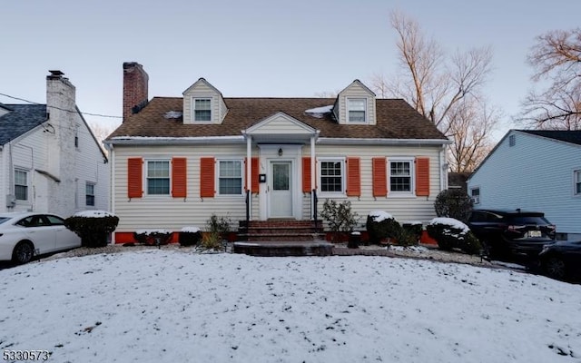 view of new england style home