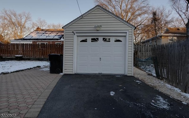 view of snow covered garage