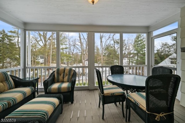 sunroom featuring a wealth of natural light