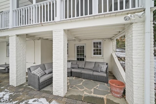 view of patio / terrace featuring a balcony and outdoor lounge area