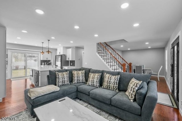 living room featuring hardwood / wood-style floors and wine cooler