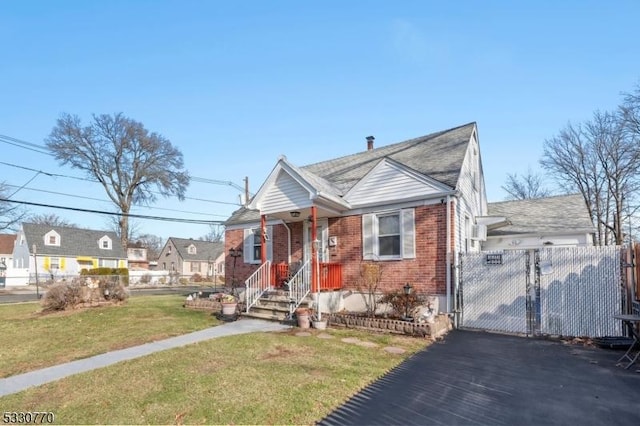 bungalow with a front yard