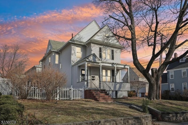 view of front property with a lawn