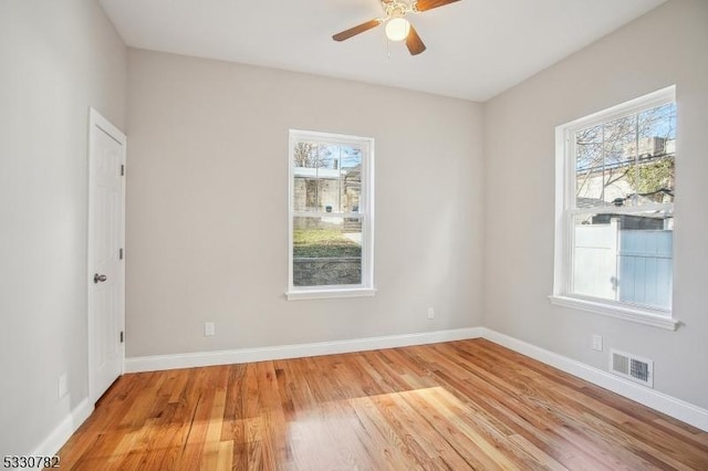 unfurnished room featuring ceiling fan and light hardwood / wood-style flooring