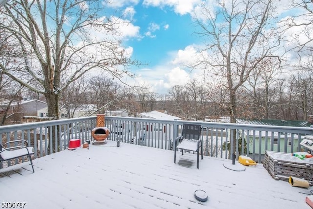 view of snow covered deck