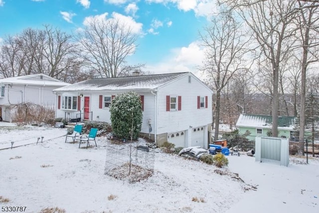 view of snow covered house