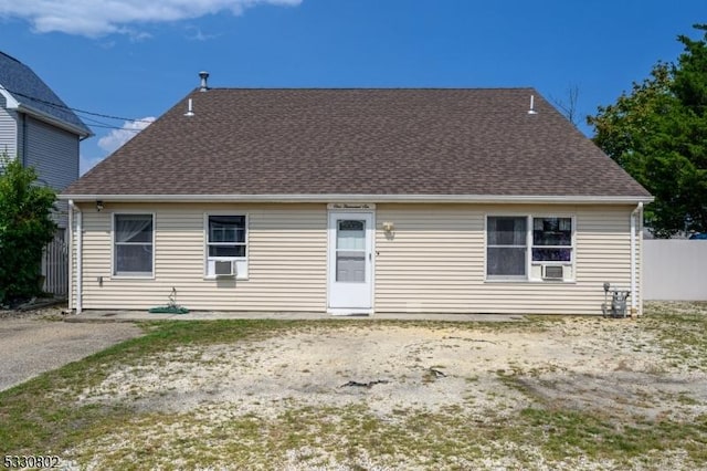 back of property with cooling unit