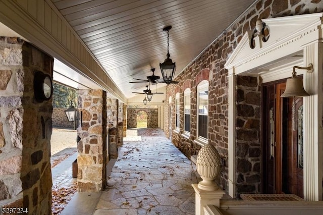 view of patio / terrace featuring ceiling fan