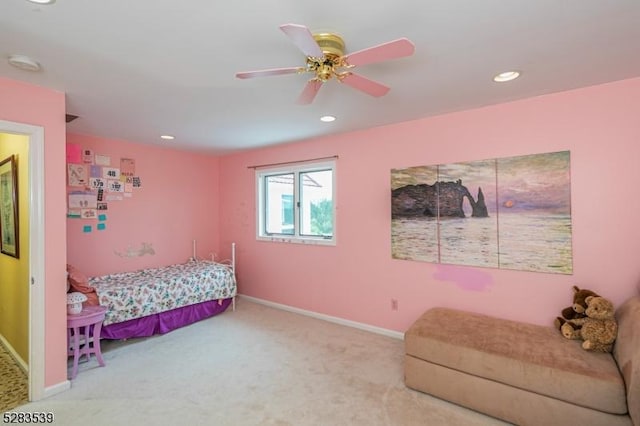 bedroom with ceiling fan and light colored carpet