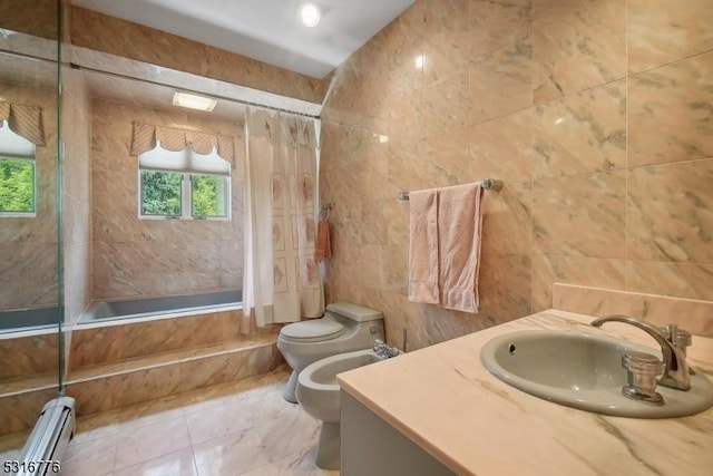 full bathroom featuring baseboard heating, bathing tub / shower combination, a bidet, vanity, and tile walls