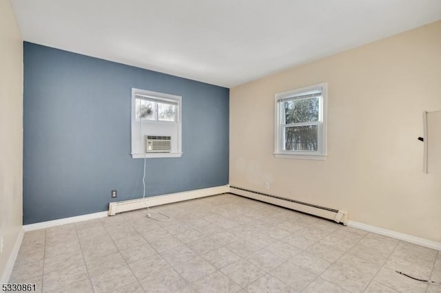 empty room with plenty of natural light and a baseboard radiator