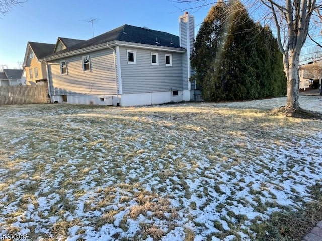 view of snow covered house