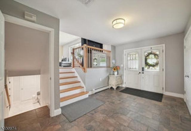 entrance foyer with french doors and a wealth of natural light