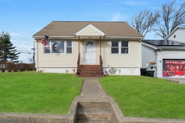 view of front facade with a front yard