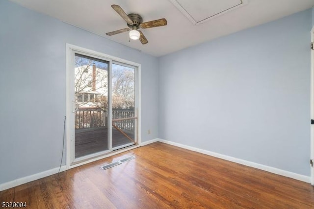 unfurnished room with hardwood / wood-style flooring and ceiling fan