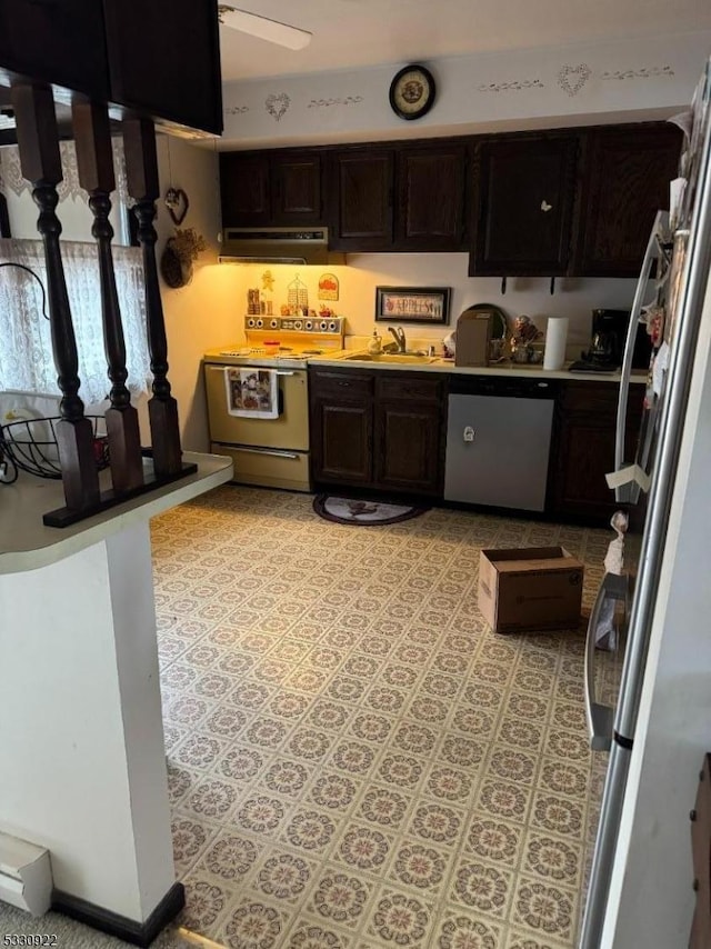 kitchen featuring electric range, sink, stainless steel dishwasher, range hood, and dark brown cabinets