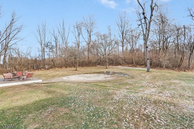 view of yard with a deck