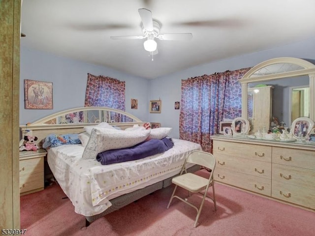 bedroom featuring ceiling fan and carpet floors