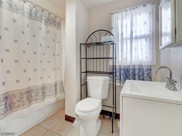 full bathroom featuring tile patterned floors, a wealth of natural light, sink, and toilet