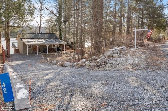 view of yard with a carport