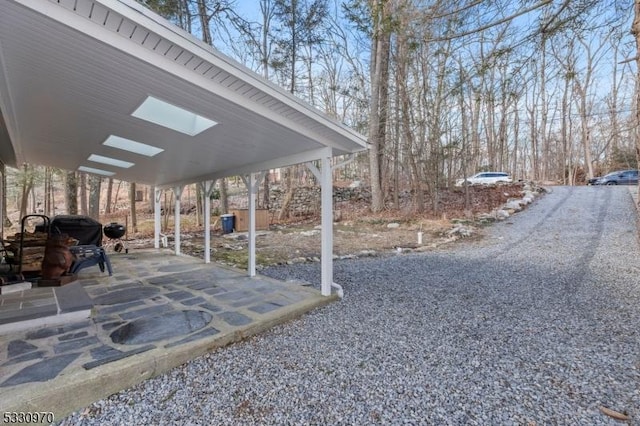 view of home's community with a carport