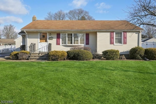 view of front of property with a front lawn