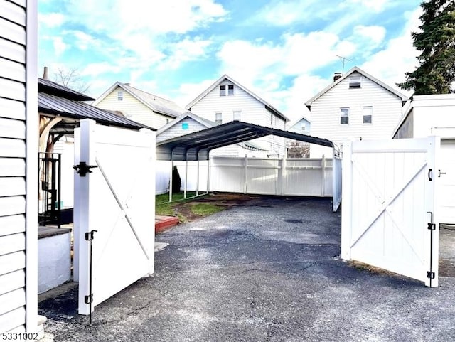 view of patio / terrace featuring a carport