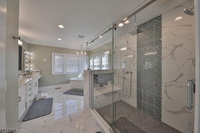 bathroom featuring vanity, independent shower and bath, and a chandelier