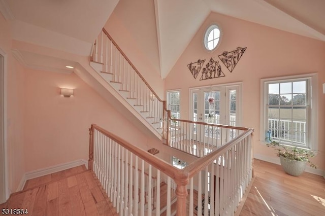 stairs with hardwood / wood-style flooring