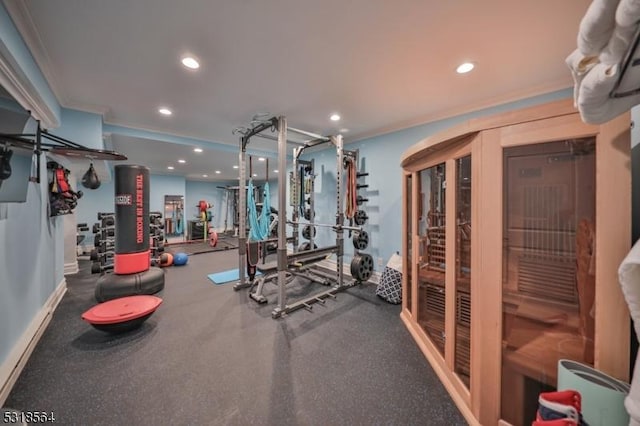 exercise room with ornamental molding