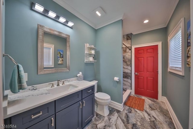 bathroom with vanity, a shower, toilet, and crown molding